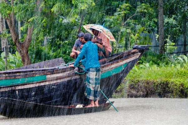 Trade on a floating market in Bangladesh during monsoon