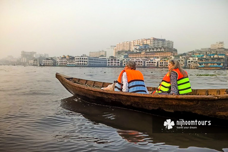 Boat ride on River Buriganga on our Dhaka City Tour with proper safety