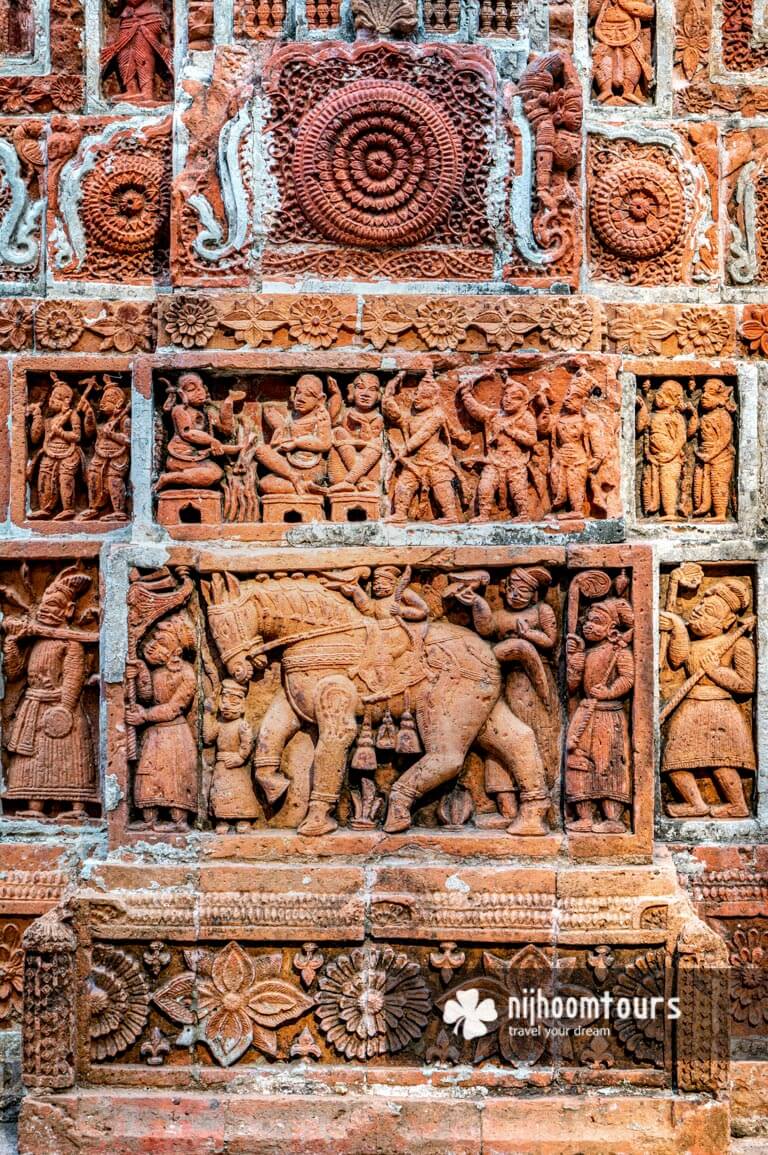Terracotta work at the wall of Kantojir Mondir